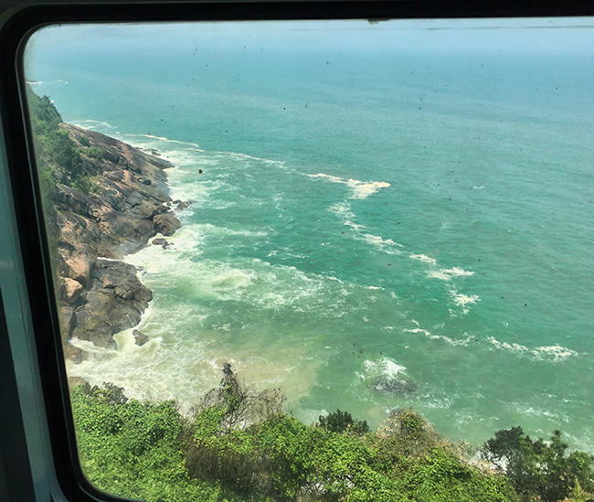 The ocean outside of the train window